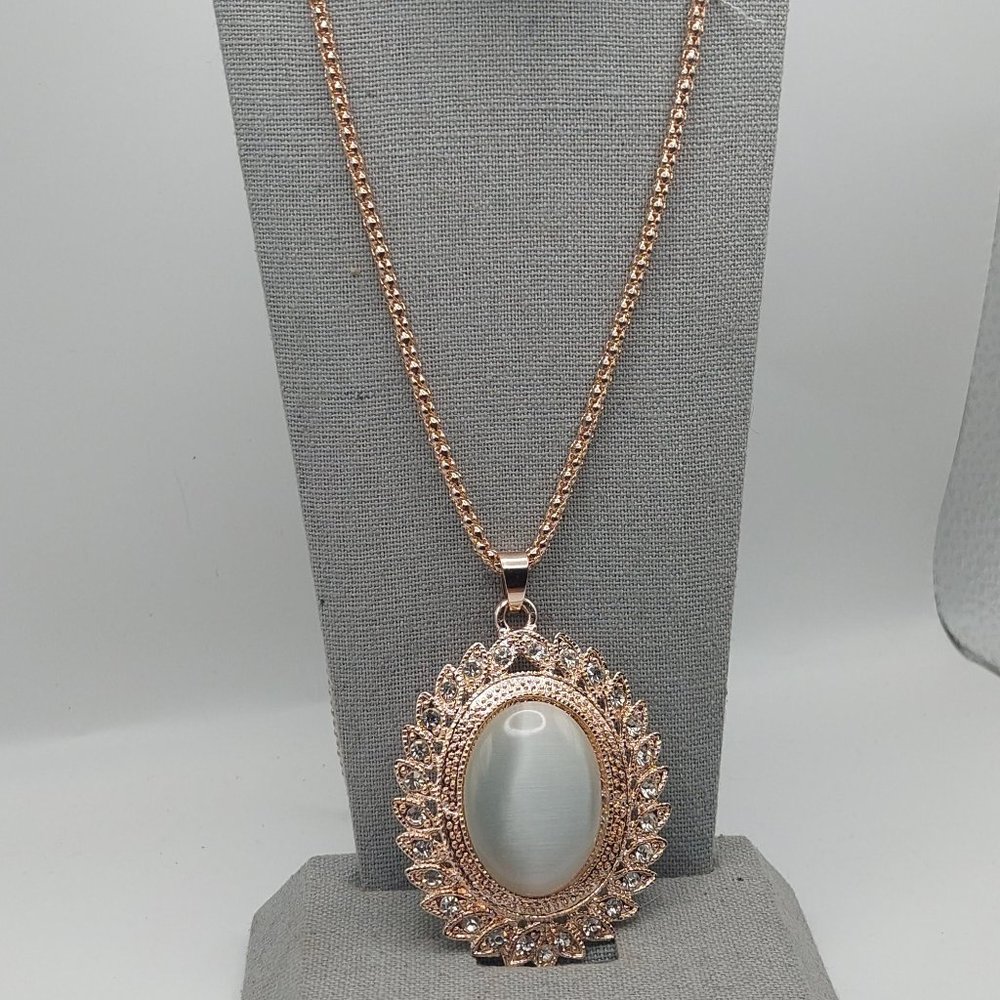 Gold and White Pendant Necklace